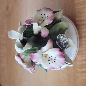 Capodimonte Italian porcelain orchids. Lavender and white orchids .